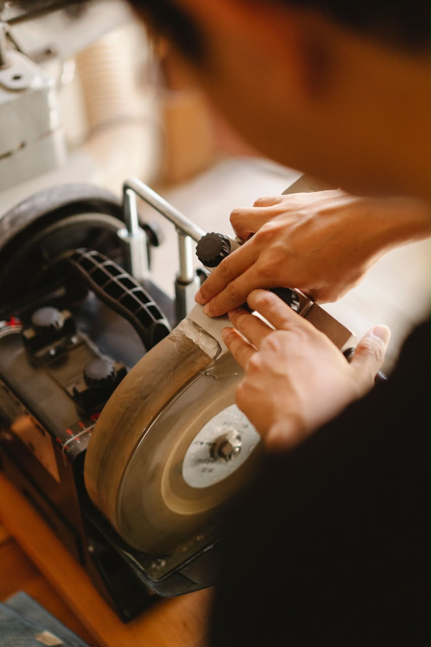 A craftsperson at work in the Green Plus workshop